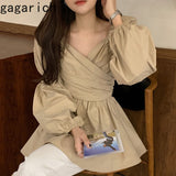Christmas Gift Gagarich Women Shirt 2021 Spring Autumn Korean Chic Vintage Temperament Ladies V-Neck Puff Sleeve Cross Pleated Design Blouses